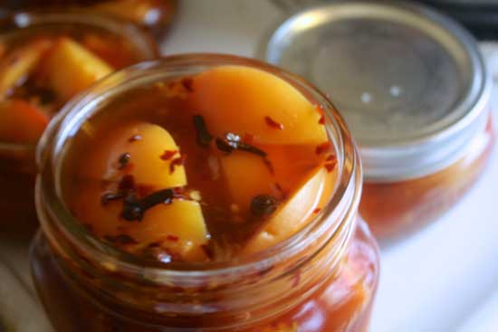 Fall-spiced peaches, with cloves, crushed red pepper, cinnamon, and chili pepper. There might kinda sorta maybe be bourbon in there too... but we won't talk about that.